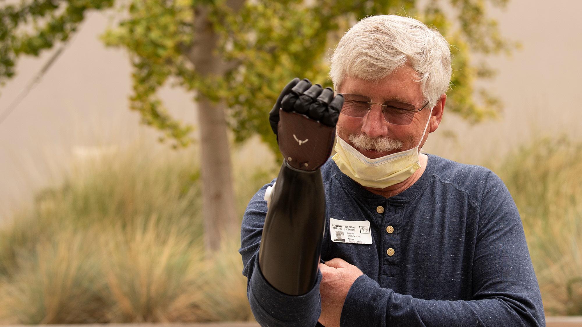 A From Labs to Lives campaign participant with his prosthetic arm